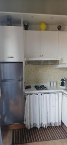A kitchen or kitchenette at Studio via Matteotti Még 7 kép