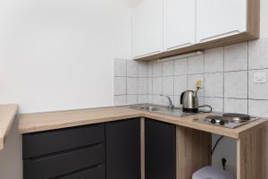 Kuchyň nebo kuchyňský kout v ubytování Apartments by the sea Mimice, Omis - 2736