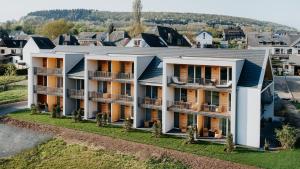 an aerial view of a large apartment building at Hotel Restaurant zur Marienburg in Pünderich