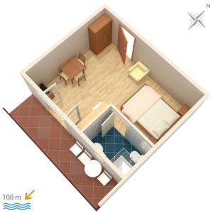 a floor plan of a room with a table and chairs at Studio Duce 2821a in Duće