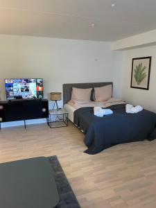 מיטה או מיטות בחדר ב-CPH Lux Apartments KH