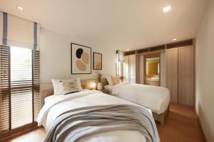 Marasca Khao Yai - Eco-friendly Glamping Escape Near National Park客房内的一张或多张床位