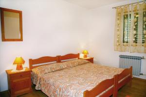 Postel nebo postele na pokoji v ubytování Apartments and rooms with parking space Bol, Brac - 2873