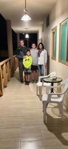 a group of people standing in a hallway at Casamar in Máncora