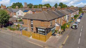 an aerial view of a house on a street at Unique apartment with parking / sofa bed in Norwich