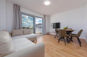 TV a/nebo společenská místnost v ubytování Rooms & Apartments Niko