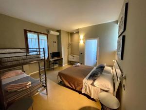 Postel nebo postele na pokoji v ubytování B&B Aurora