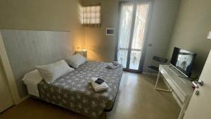 Postel nebo postele na pokoji v ubytování B&B Aurora