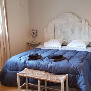 Postel nebo postele na pokoji v ubytování Gîte du caveau