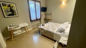 Postel nebo postele na pokoji v ubytování B&B Aurora
