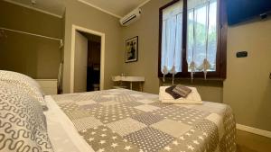 Postel nebo postele na pokoji v ubytování B&B Aurora
