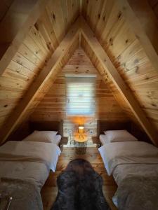 A bed or beds in a room at Mountain Villas Žabljak