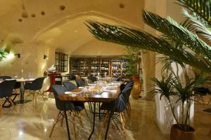 Restoran või mõni muu söögikoht majutusasutuses Sant'Angelo, Matera - Small Luxury Hotels