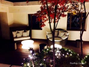 Ein Sitzbereich in der Unterkunft The Grand Hotel Myeongdong