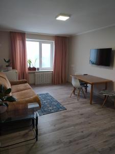 TV a/nebo společenská místnost v ubytování Hotel Trias