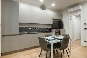 A kitchen or kitchenette at Fragole Suite