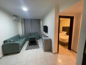 TV a/nebo společenská místnost v ubytování Golden Hotel