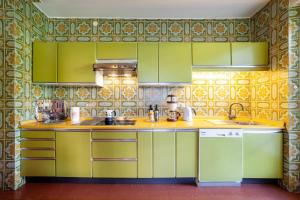 A kitchen or kitchenette at Villa Coris Ferienwohnung Palma