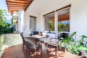 A balcony or terrace at Villa Coris Ferienwohnung Palma