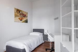 Postel nebo postele na pokoji v ubytování Tagliacozzi Suite Apartment