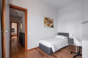 Postel nebo postele na pokoji v ubytování Tagliacozzi Suite Apartment