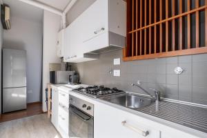 Kuchyň nebo kuchyňský kout v ubytování Tagliacozzi Suite Apartment