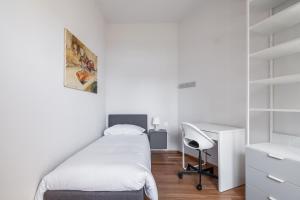 Postel nebo postele na pokoji v ubytování Tagliacozzi Suite Apartment