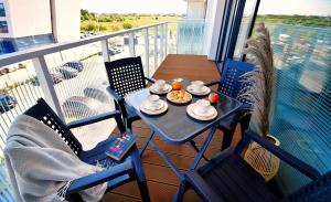 Balkón nebo terasa v ubytování Apartments AQUA & SPA