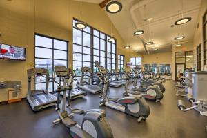 a gym with a bunch of cardio equipment in it at Family-Friendly Galena Townhome with Community Pools in Galena