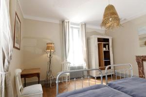 Posteľ alebo postele v izbe v ubytovaní Château d'Arfeuilles Chambres et tables d'hôtes
