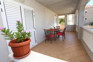 Ein Balkon oder eine Terrasse in der Unterkunft Apartments Marin