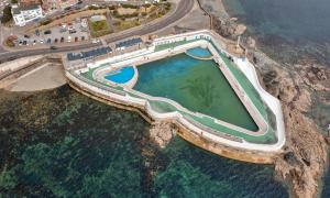 an overhead view of a pool in the ocean at Finest Retreats - Poppy Cottage of Penzance in Penzance