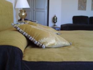 Posteľ alebo postele v izbe v ubytovaní Hotel Santa Coloma del Camino