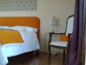 Posteľ alebo postele v izbe v ubytovaní Hotel Santa Coloma del Camino