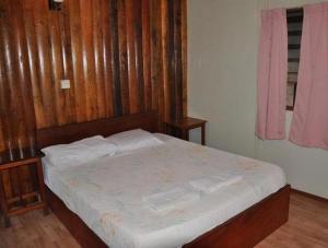 Кровать или кровати в номере Sepilok Jungle Resort