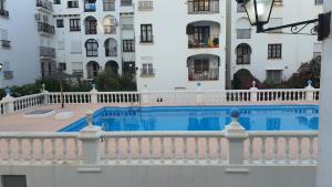 The swimming pool at or close to Apartamentos SABINILLAS