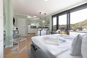 Postel nebo postele na pokoji v ubytování Dünenloft