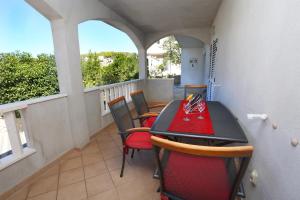 Ein Balkon oder eine Terrasse in der Unterkunft Apartments Marin