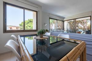 Posezení v ubytování Can Costelles Cambrils - Ático en primera línea con vistas, piscina y parking
