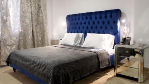 Ένα ή περισσότερα κρεβάτια σε δωμάτιο στο Hotel Delphin-Nouadhibou
