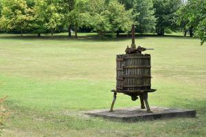 a statue of a grill in the middle of a field at La Cà dOlga in La Morra