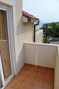 Balkón nebo terasa v ubytování Apartments by the sea Postira, Brac - 3244