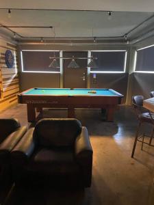 a billiard room with a pool table in it at Unique space in Gerakas - Cave in Athens