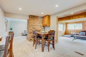 a kitchen and dining room with a table and chairs at Escape at Edgewood in Stateline