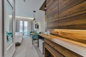 Voodi või voodid majutusasutuse Hotel Vladimir toas