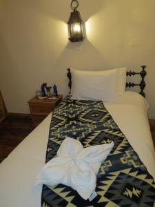 Cama o camas de una habitación en Land of the Sun Hotel & Spa