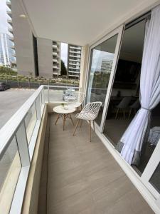 Un balcón o terraza de Tranquilo departamento Dunas de Concon