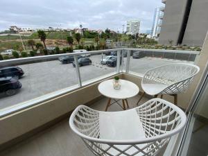 Un balcón o terraza de Tranquilo departamento Dunas de Concon