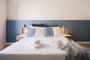 A bed or beds in a room at La Dolce Vita Ottaviano