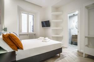 A bed or beds in a room at La Dolce Vita Ottaviano